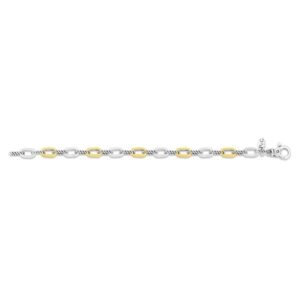 Sterling silver and 18 karat gold paperclip bracelet. 7.5 inches.