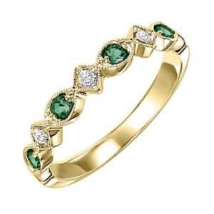 10 karat yellow gold ring with diamonds and emeralds.