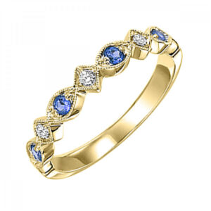10 karat yellow gold ring with diamonds and sapphires.