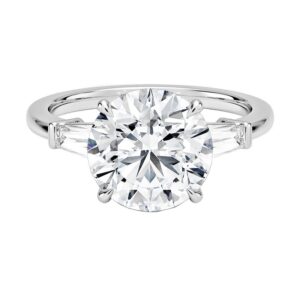 14 Karat Gold Newborn Created Diamond Engagement Ring with one 3CT center round and two 3/4tw baguettes