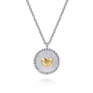 14 karat yellow gold and sterling silver pendant by Gabriel & Co.