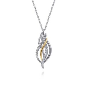 14 karat yellow gold and sterling silver pendant with white sapphires by Gabriel & Co.