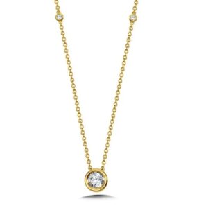14 karat yellow gold bezel set diamond necklace with 1/10 carat total weight of round brilliant diamonds.